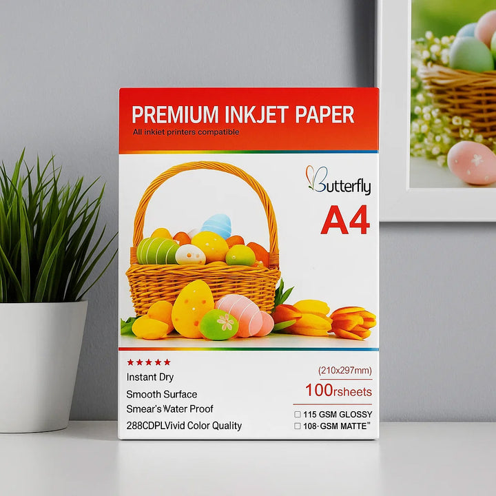 Butterfly Premium Inkjet Paper packaging with Easter design on a gray surface.