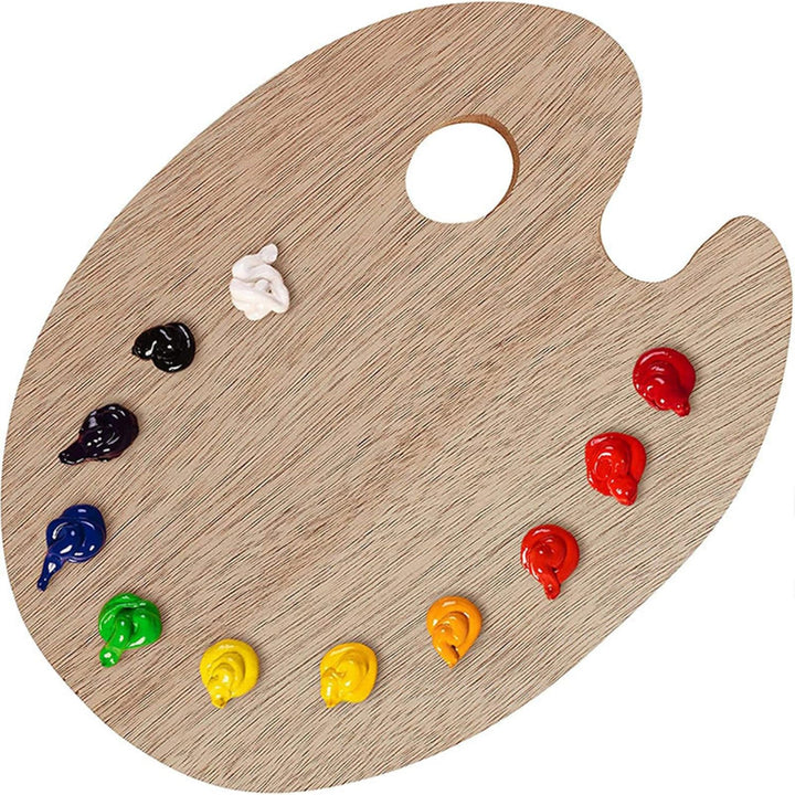 Wooden artist's palette with colorful paint samples on a white background