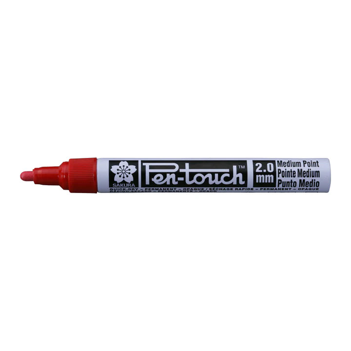 Pen-touch marker with red cap on a white background