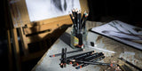 Derwent Tinted Charcoal Pencils Tin Pack Of 24 - thestationerycompany.pk